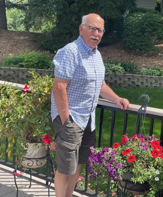 Frank Meuers stands in his garden