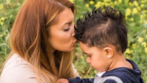 Mother and son together outside.