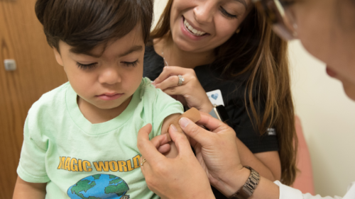 Child receiving vaccine