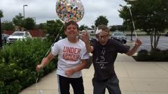 Clayton Cowan and his brother celebrate.