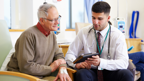 Doctor with older patient