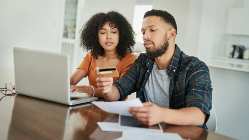 Couple making a payment