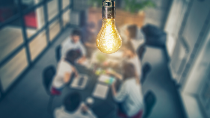 group of people around a conference table